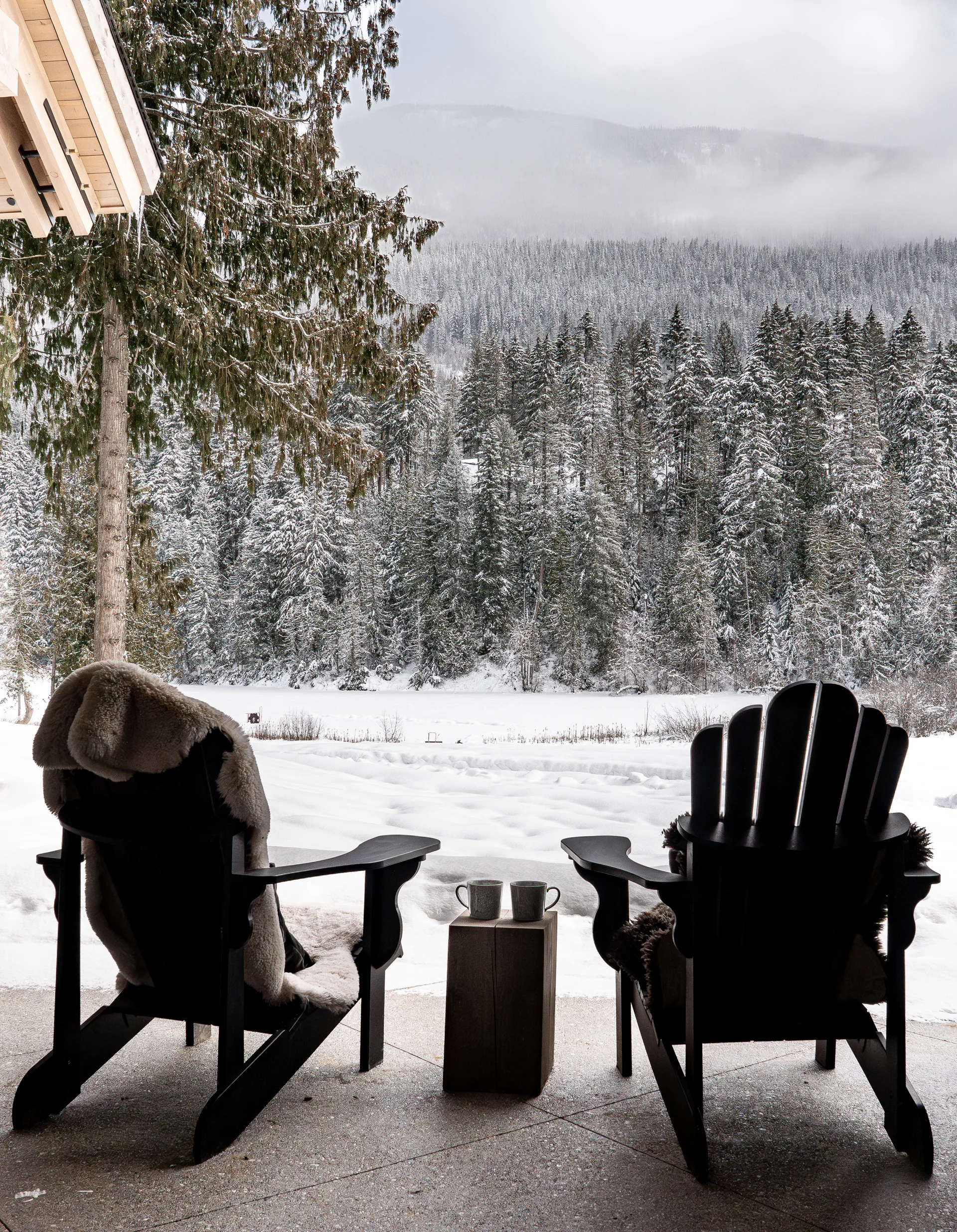 Chairs on the back patio with mountain views