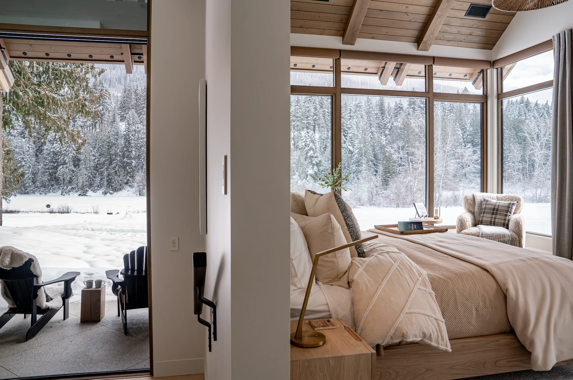 Master suite with floor to ceiling windows and access to outdoor patio.