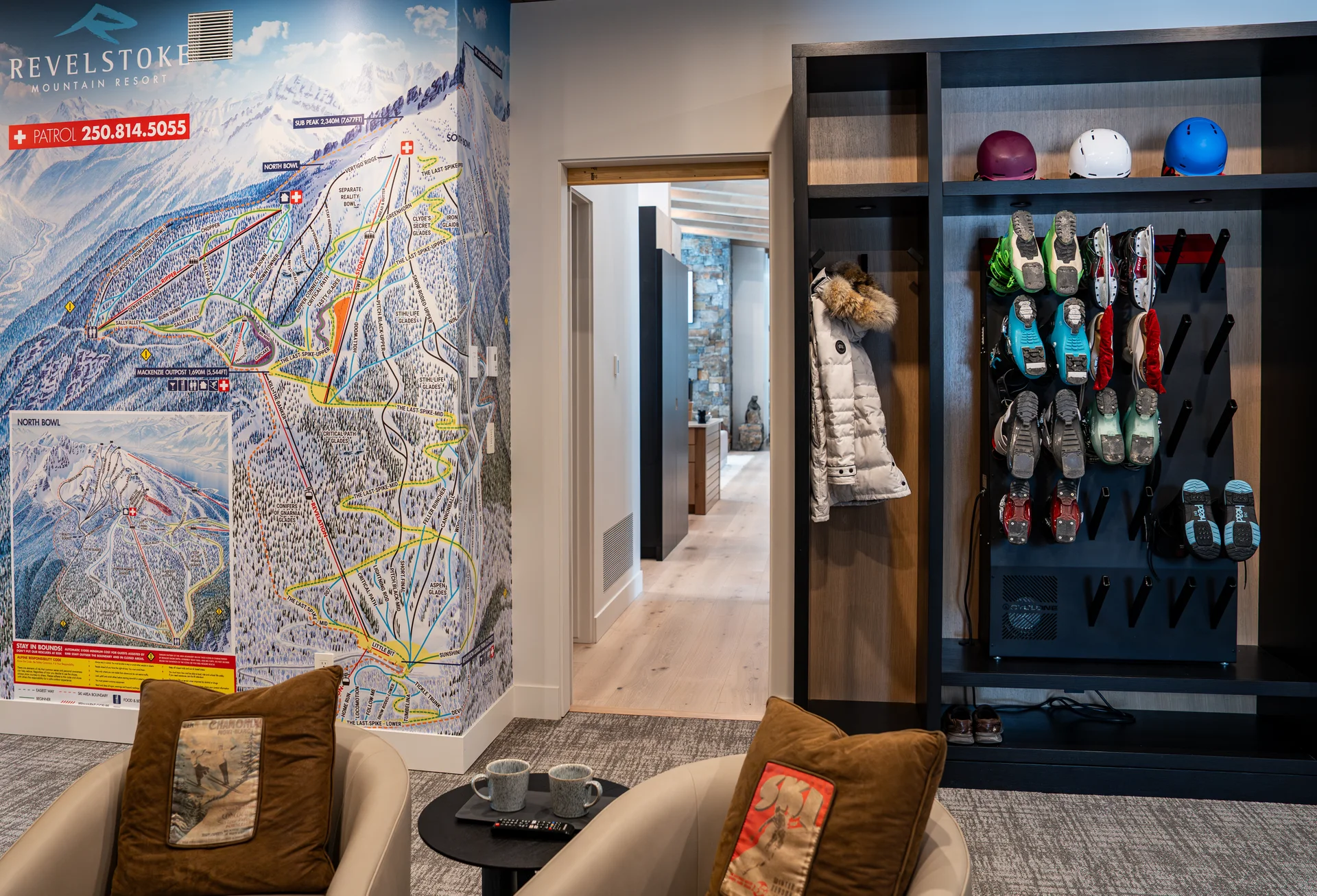 The Boot Room with large map of the ski hill and boot drying rack.